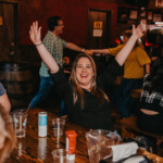 Woman having fun with her hands up in the air