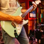 a musician playing a guitar
