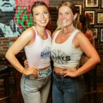 Two daisy servers smiling