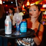 a waitress with a drink tray