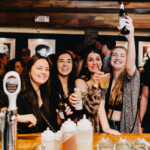 Group of Girls having fun at the bar